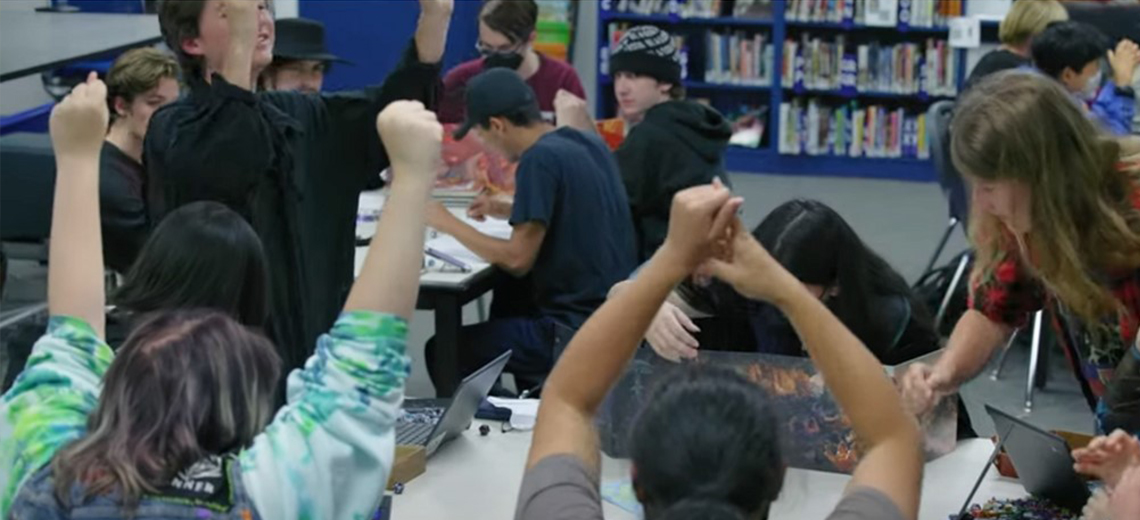 school aged kids playing dungeons and dragons